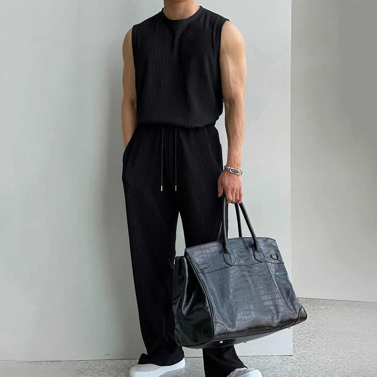 PLEATED SLEEVELESS SHIRT & WIDE DRAWSTRING PANTS